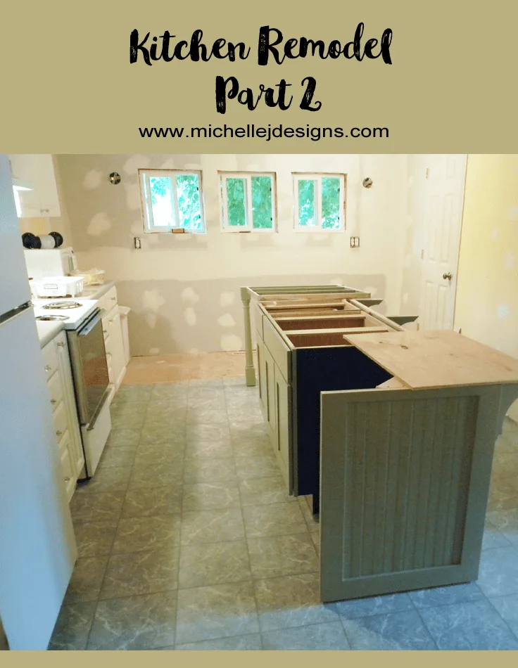 Kitchen Remodel Part 2 - www.michellejdesigns.com -  In this post you can see the beginnings of our gorgeous island and our new flooring!
