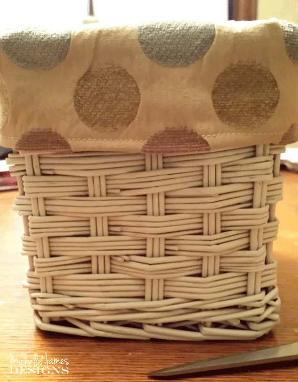 DIY Lined Baskets - Side view of the nice white basket with the liner folded over the top of the basket. 