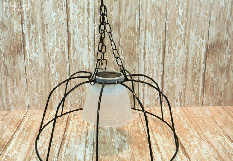 The hanging solar light ready to be hung up outside on the back patio.