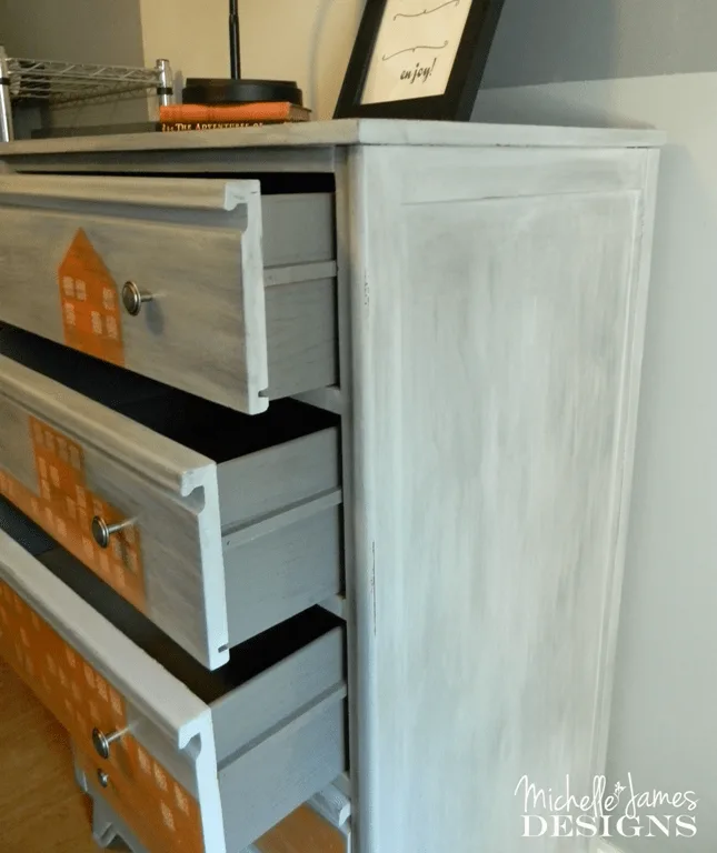 Cityscape Dresser Flip - www.michellejdesigns.com - A dresser for storage in the guest bedroom and created for the Fab Furniture Flippin Contest