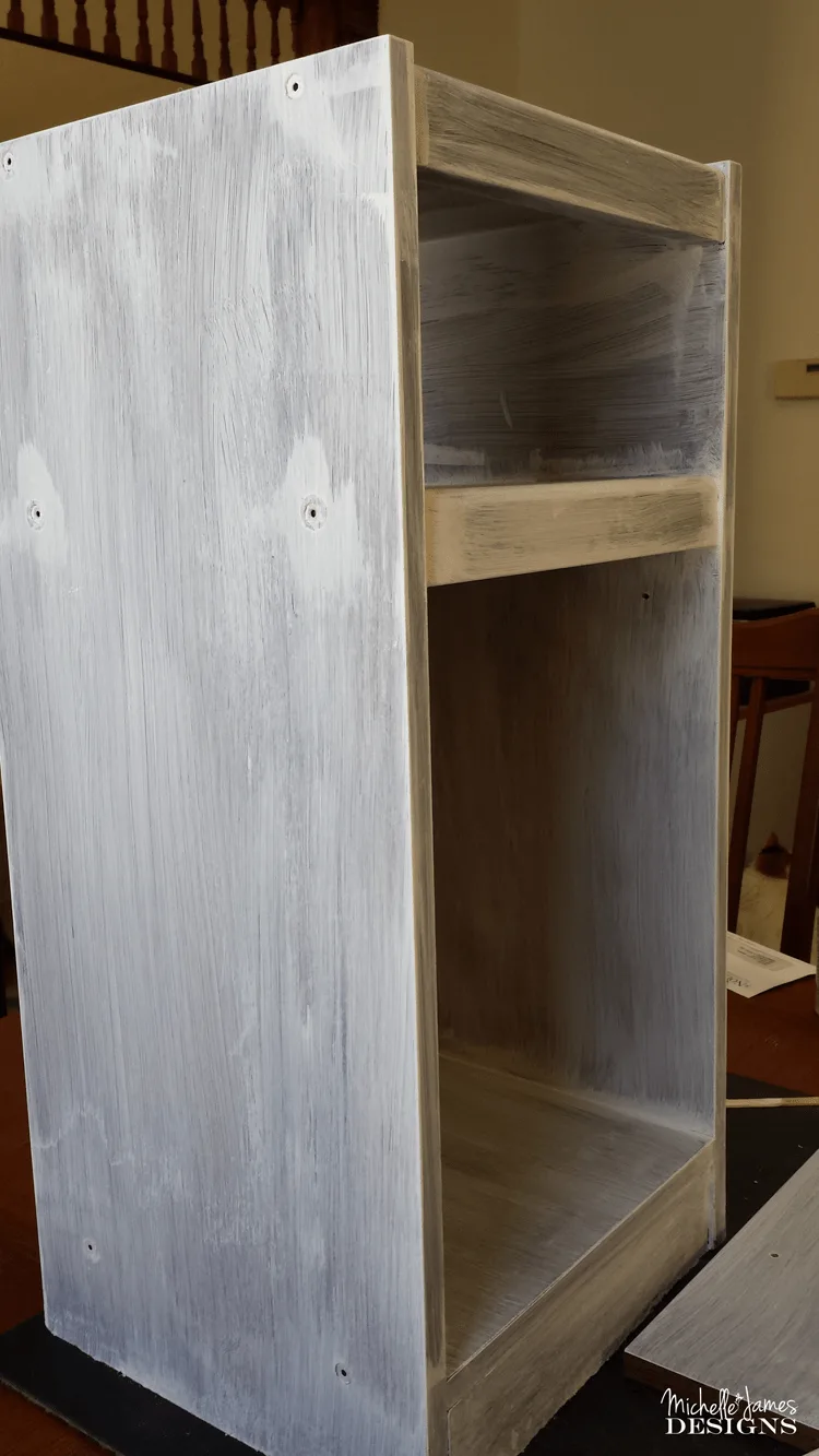 Cabinet Makeover for Baby's Room - www.michellejdesigns.com - See how I transformed this veneer cabinet into a baby's room treasure!