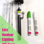 A vase, a solar light and oil based sharpie markers to make diy outdoor solar lights.
