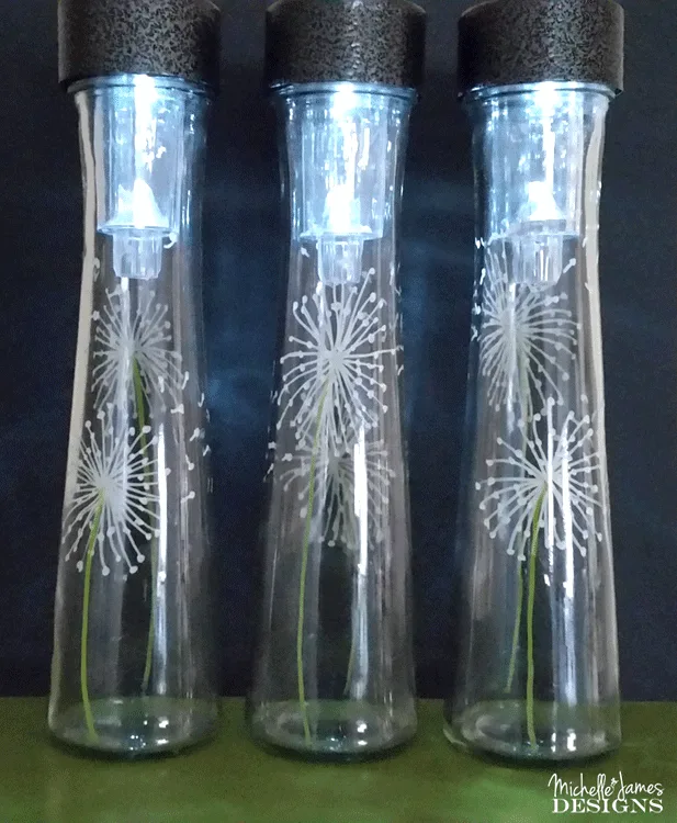 These dollar store vases outdoor solar lights are so easy to make and fast too. #dollarstorecrafts #dollarstorelighting #diyoutdoorlighting - www.michellejdesigns.com