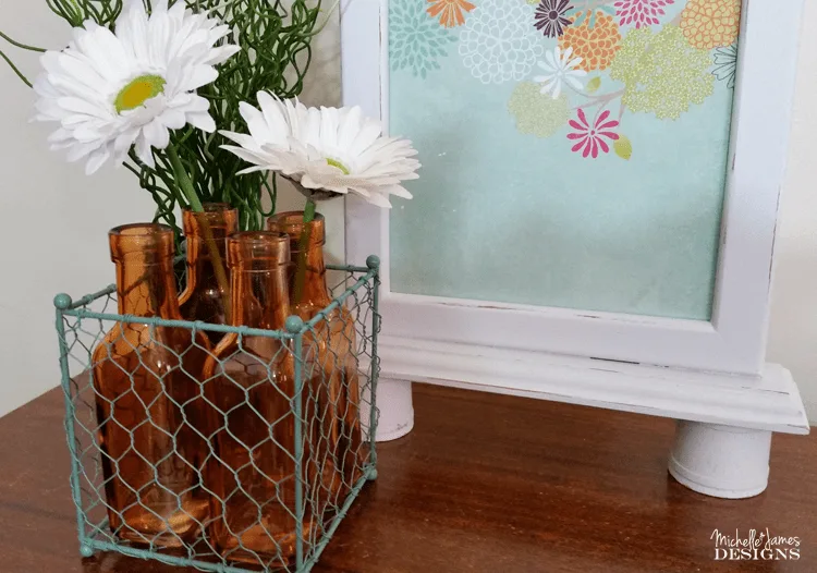 Wire Basket Makeover - www.michellejdesigns.com - this garage sale ugly duckling gets turned into something beautiful with just some paint!