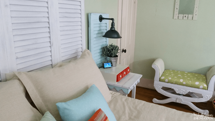 DIY Shutter Headboard - www.michellejdesigns.com - See how I created a headboard and bedside table sconces by using garage sale shutters!