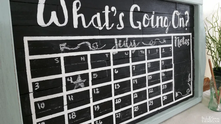 How To Create A Chalkboard Calendar - www.michellejdesigns.com - Create and amazing and affordable chalkboard calendar with a frame, some wood and some paint!