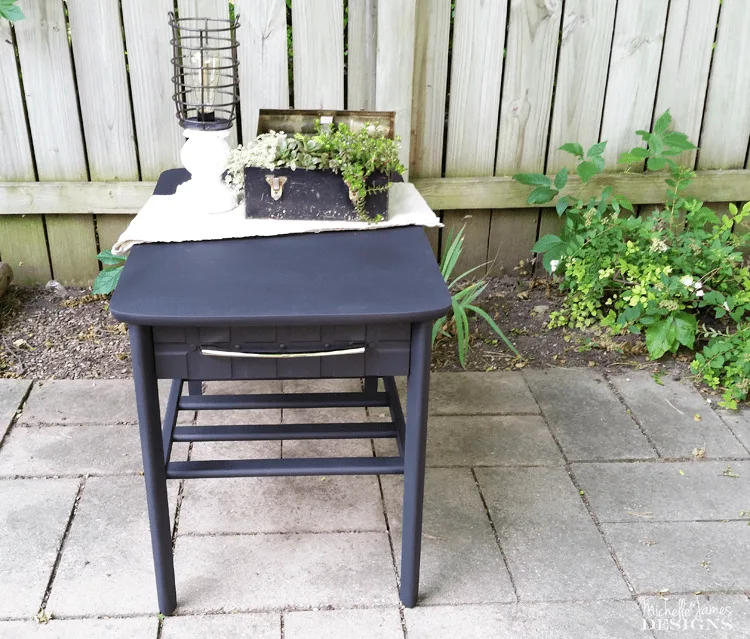 Sleek Black Table Makeover - www.michellejdesigns.com - I used Old Fashioned Milk Paint to transform this table into a sleek table for my son's apartment!