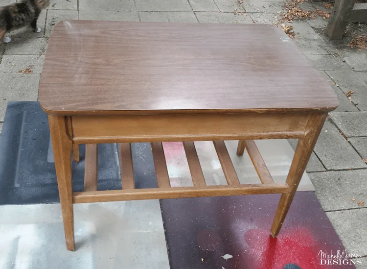 Sleek Black Table Makeover - www.michellejdesigns.com - I used Old Fashioned Milk Paint to transform this table into a sleek table for my son's apartment!