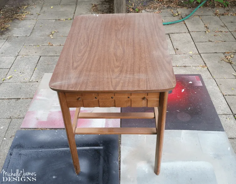 Sleek Black Table Makeover - www.michellejdesigns.com - I used Old Fashioned Milk Paint to transform this table into a sleek table for my son's apartment!