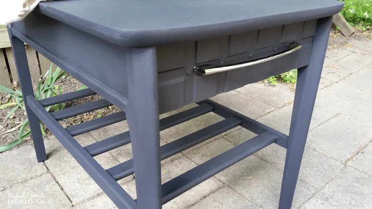 Sleek Black Table Makeover - www.michellejdesigns.com - I used Old Fashioned Milk Paint to transform this table into a sleek table for my son's apartment!