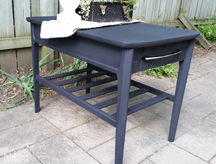 Sleek Black Table Makeover - www.michellejdesigns.com - I used Old Fashioned Milk Paint to transform this table into a sleek table for my son's apartment!