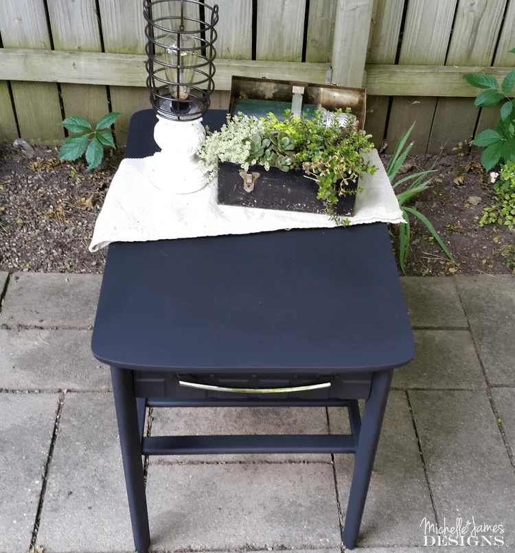 Sleek Black Table Makeover - www.michellejdesigns.com - I used Old Fashioned Milk Paint to transform this table into a sleek table for my son's apartment!