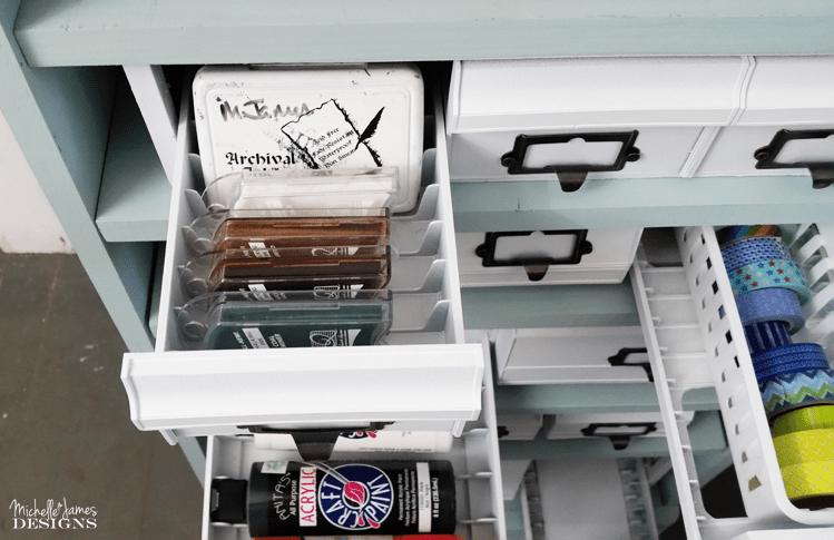 Craft Organizer - www.michellejdesigns.com - I found a bunch of the old 80's cassette, cd and vhs holders and gave them a cohesive look to create this awesome craft organizer!