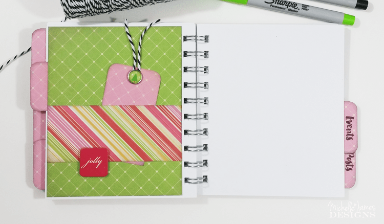 Holiday-Planner - www.michellejdesigns.com - I used a collection of Christmas scrapbook papers and a 4x5 notebook to create a functional holiday planner to help keep everything organized this season!