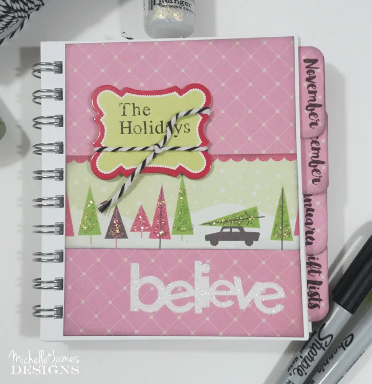 Holiday-Planner - www.michellejdesigns.com - I used a collection of Christmas scrapbook papers and a 4x5 notebook to create a functional holiday planner to help keep everything organized this season!