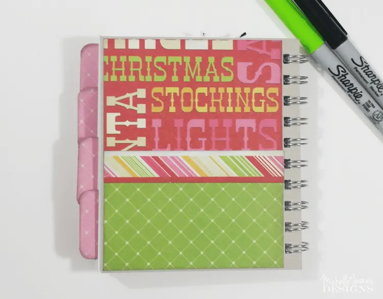 Holiday-Planner - www.michellejdesigns.com - I used a collection of Christmas scrapbook papers and a 4x5 notebook to create a functional holiday planner to help keep everything organized this season!