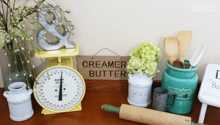 Thrift Store Ceramic Milk Cans - www.michellejdesigns.com - I turned these ceramic milk cans into decor for my kitchen. They are now the perfect farmhouse look that is so popular now!