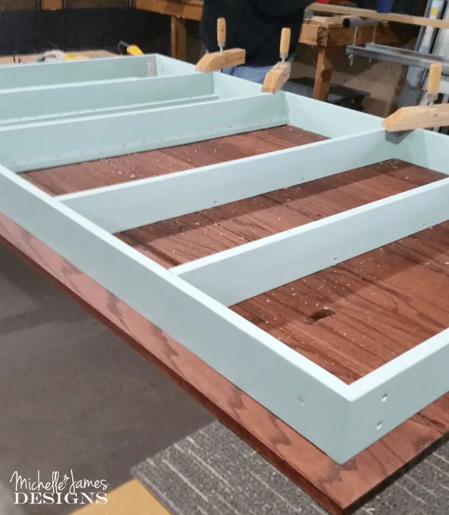 This DIY dining table was made with an oak top and a painted base and was the perfect custom fit for my son and daughter-in-law's dining room.