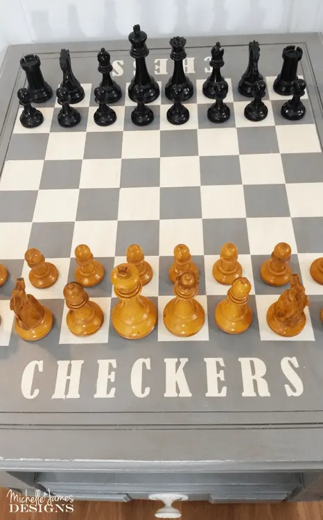 I used a HomeRight paint sprayer, some spray paint and some masking materials to paint a chess and checkers board. This was a fun DIY game table that anyone can create