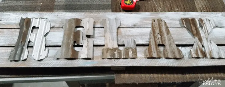 Using an old wood sign and some rusty letters from Custom Cut Decor I was able to create a rustic farmhouse sign that is perfect in our guest room!