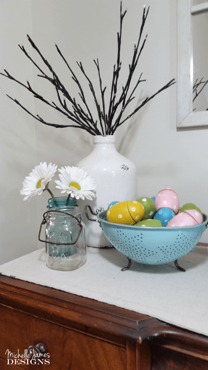 I gave this thrift store vintage colander a new look with teal spray paint. Now it is the perfect look for my home decor! www.michellejdesigns.com