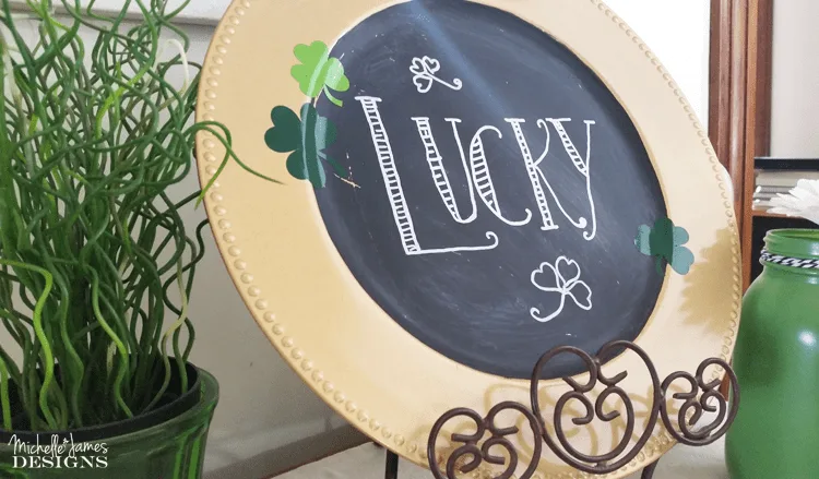 A dollar store charger plate and some chalkboard paint can make a lucky St Patrick's Day Chalkboard to add to your holiday decor!