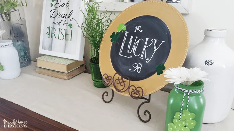 A dollar store charger plate and some chalkboard paint can make a lucky St Patrick's Day Chalkboard to add to your holiday decor!