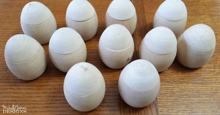 Wooden eggs before they are painted.  They are raw wood and have a portion of the top that can be removed for candy or whatever.