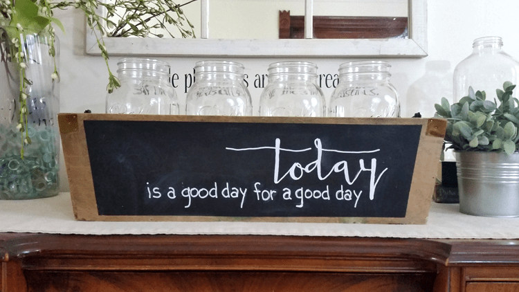 I spotted this wooden box at a garage sale and knew I could hide the ugly painted side with chalkboard paint. So that is exactly what I did. Now I have the perfect farmhouse wooden box for my home! - www.michellejdesigns.com