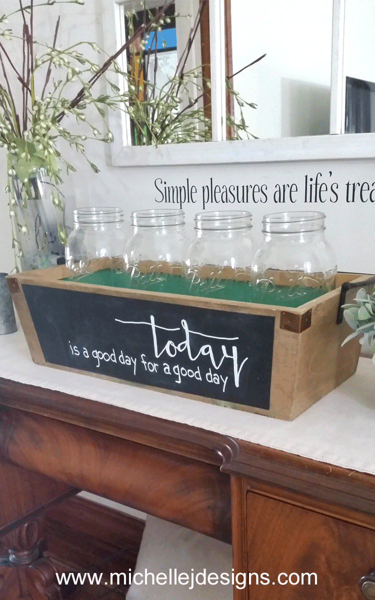 I spotted this wooden box at a garage sale and knew I could hide the ugly painted side with chalkboard paint. So that is exactly what I did. Now I have the perfect farmhouse wooden box for my home! - www.michellejdesigns.com
