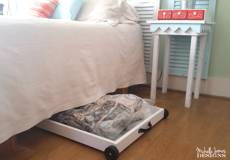 If you live in an old home like us or a home with limited storage you can get creative and use the space under your bed to create storage with storage bags. - www.michellejdesigns.com
