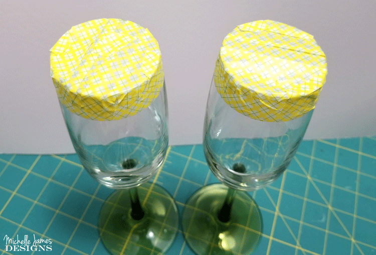 With a few supplies from the Dollar Store you are will on your way to creating some creepy skeleton wine glasses for your Halloween decor - www.michellejdesigns.com