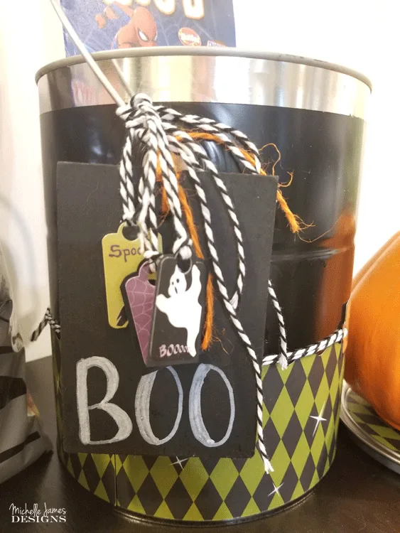 Make someone's Halloween special and BOO It Forward with a fun bucket full of surprises! - www.michelledjdesigns.com