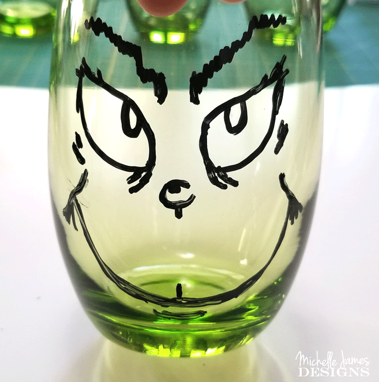 Create some fun Grinch glasses then use them for easy Grinch Gifts for neighbors, friends, or family!