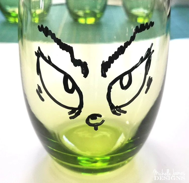 Create some fun Grinch glasses then use them for easy Grinch Gifts for neighbors, friends, or family!