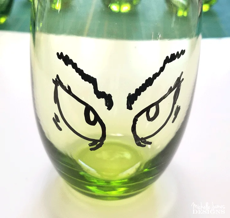 Create some fun Grinch glasses then use them for easy Grinch Gifts for neighbors, friends, or family!