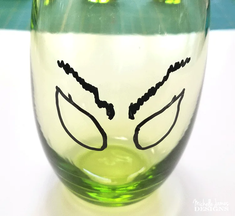 Create some fun Grinch glasses then use them for easy Grinch Gifts for neighbors, friends, or family!