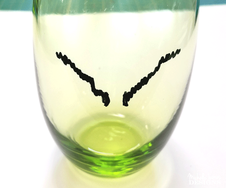 Create some fun Grinch glasses then use them for easy Grinch Gifts for neighbors, friends, or family!