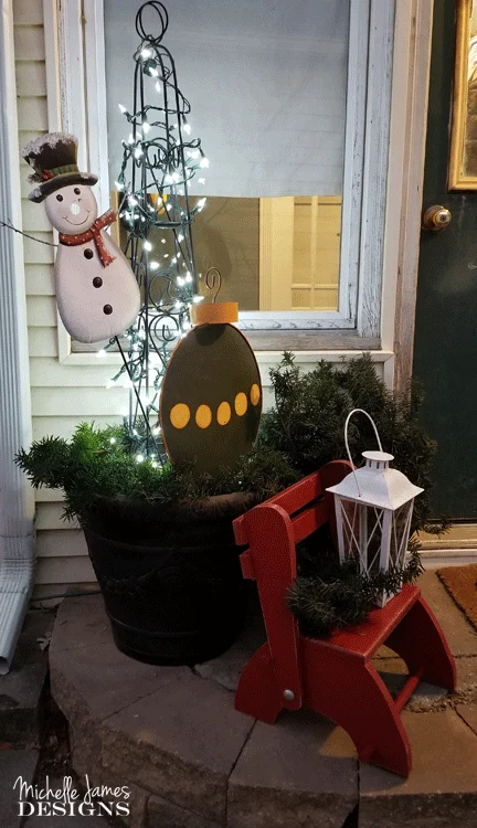 Each year I try to create some Holiday porch decor. It is my back door where friends come into the house. I try to make it festive and fun! - www.michellejdesigns.com