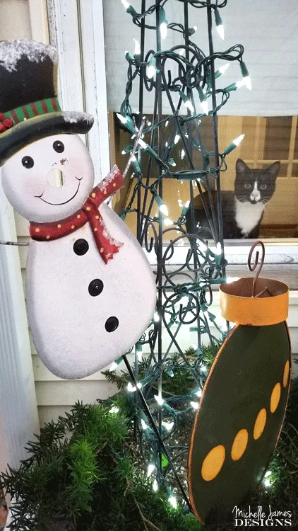 Each year I try to create some Holiday porch decor. It is my back door where friends come into the house. I try to make it festive and fun! - www.michellejdesigns.com