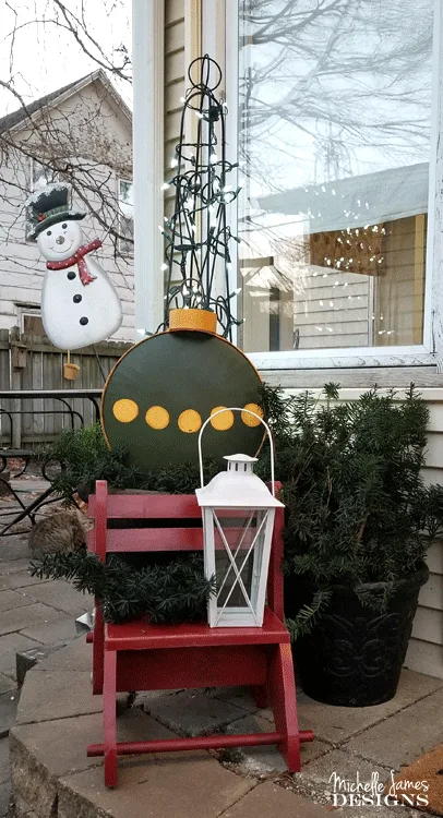 Each year I try to create some Holiday porch decor. It is my back door where friends come into the house. I try to make it festive and fun! - www.michellejdesigns.com