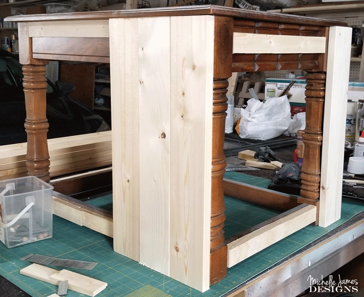 We transformed two end tables into a DIY farmhouse style cat litter box furniture to conceal a litter box. #NutrishForCats #NutrishPets #catfurniture #diy #farmhousestyle - www.michellejdesigns.com