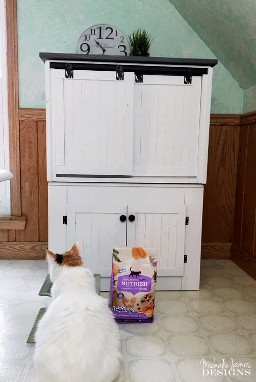 We transformed two end tables into a DIY farmhouse style cat litter box furniture to conceal a litter box. #NutrishForCats #NutrishPets #catfurniture #diy #farmhousestyle - www.michellejdesigns.com