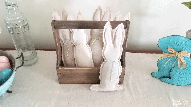 I love to create with drop cloths. They are budget friendly and give that popular farmhouse look. These drop cloth bunnies are one of my favorites! #dropcloth #dropclothprojects #farmhousestyle #bunnies - www.michellejdesigns.com