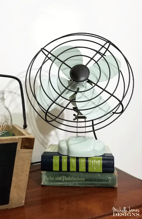 I love to bring old things back to life. This vintage style fan needed some TLC but with the help of some spray paint it now looks AMAZING! #vintagefan #upcyle #DIY - www.michellejdesigns.com