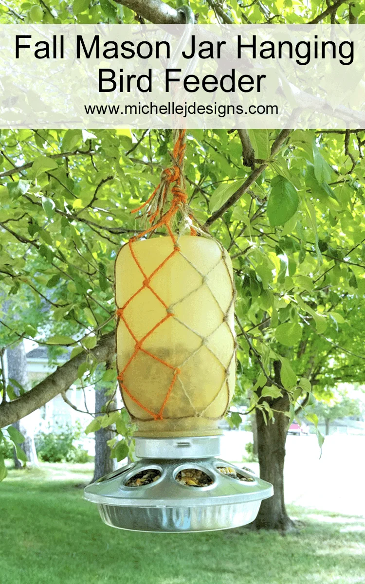 Birds need food all year long. Create a fall mason jar hanging bird feeder for them during the fall months when the weather starts to turn - www.michellejdesigns.com