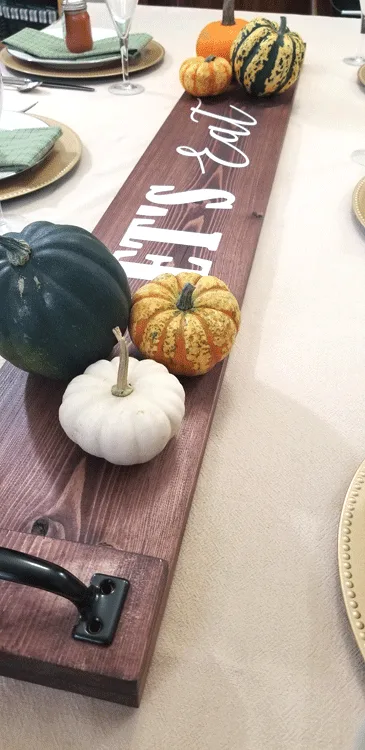 Create your own DIY Rustic Wood Table Runner with just a few materials. It is easy and it looks great! - www.michellejdesigns.com #michellejdesisgns #woodtablerunner #tablerunner #farmhousestyle