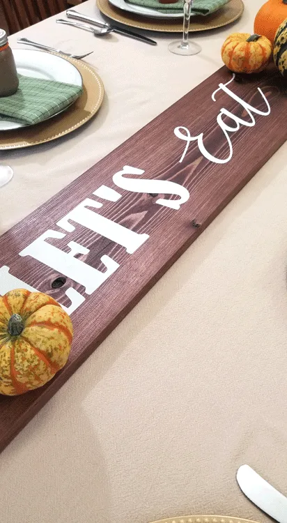 Create your own DIY Rustic Wood Table Runner with just a few materials. It is easy and it looks great! - www.michellejdesigns.com #michellejdesisgns #woodtablerunner #tablerunner #farmhousestyle