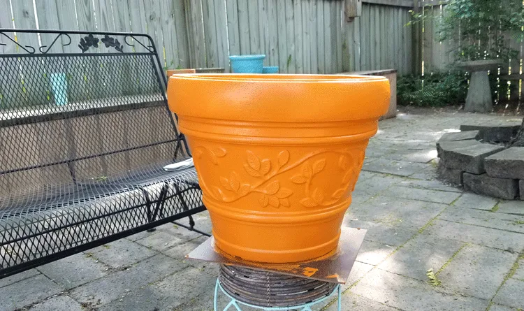 The large orange foam painted flower pot after two coats of DecorArt Outdoor Living paint.