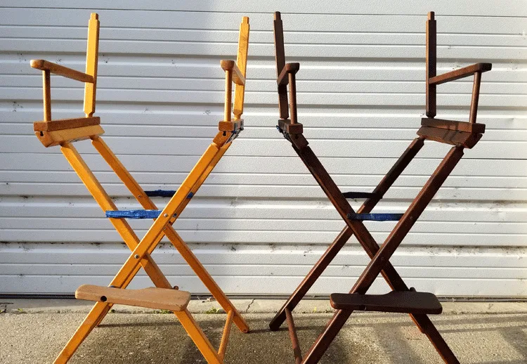 One stained director chair and one original light wood director chair.